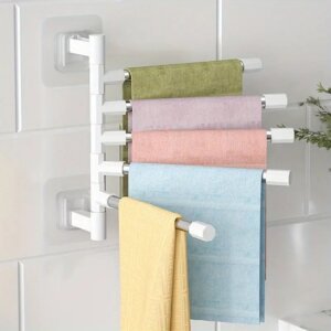 Soporte organizador giratorio autoadhesivo de acero inoxidable para baño y cocina.jpg